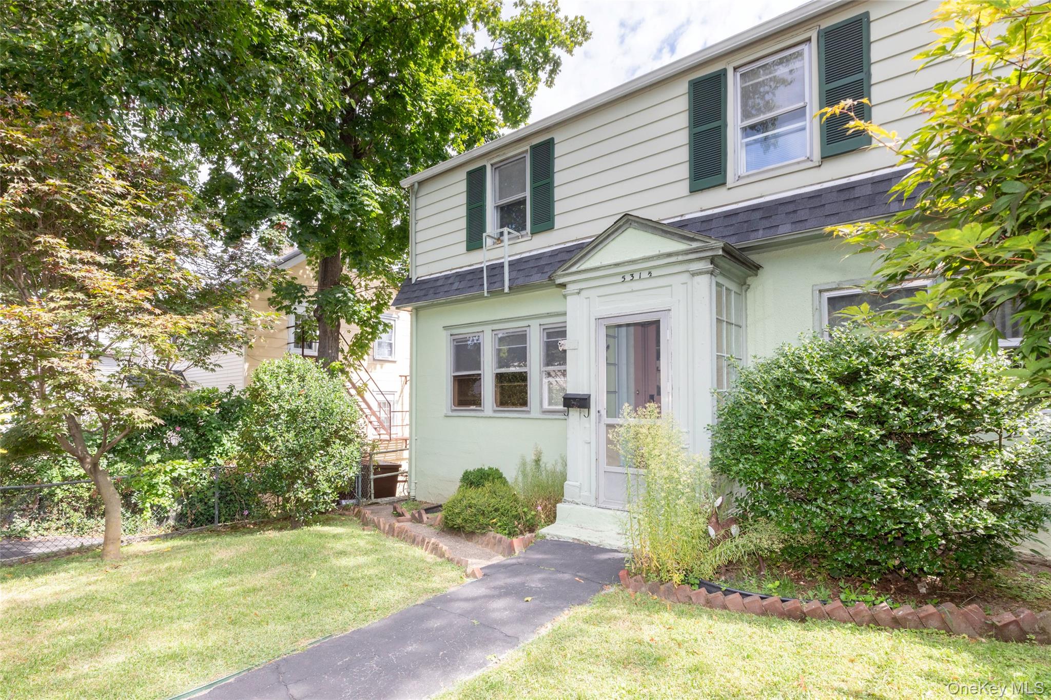 Situated in a welcoming neighborhood, this charming home offers spacio...