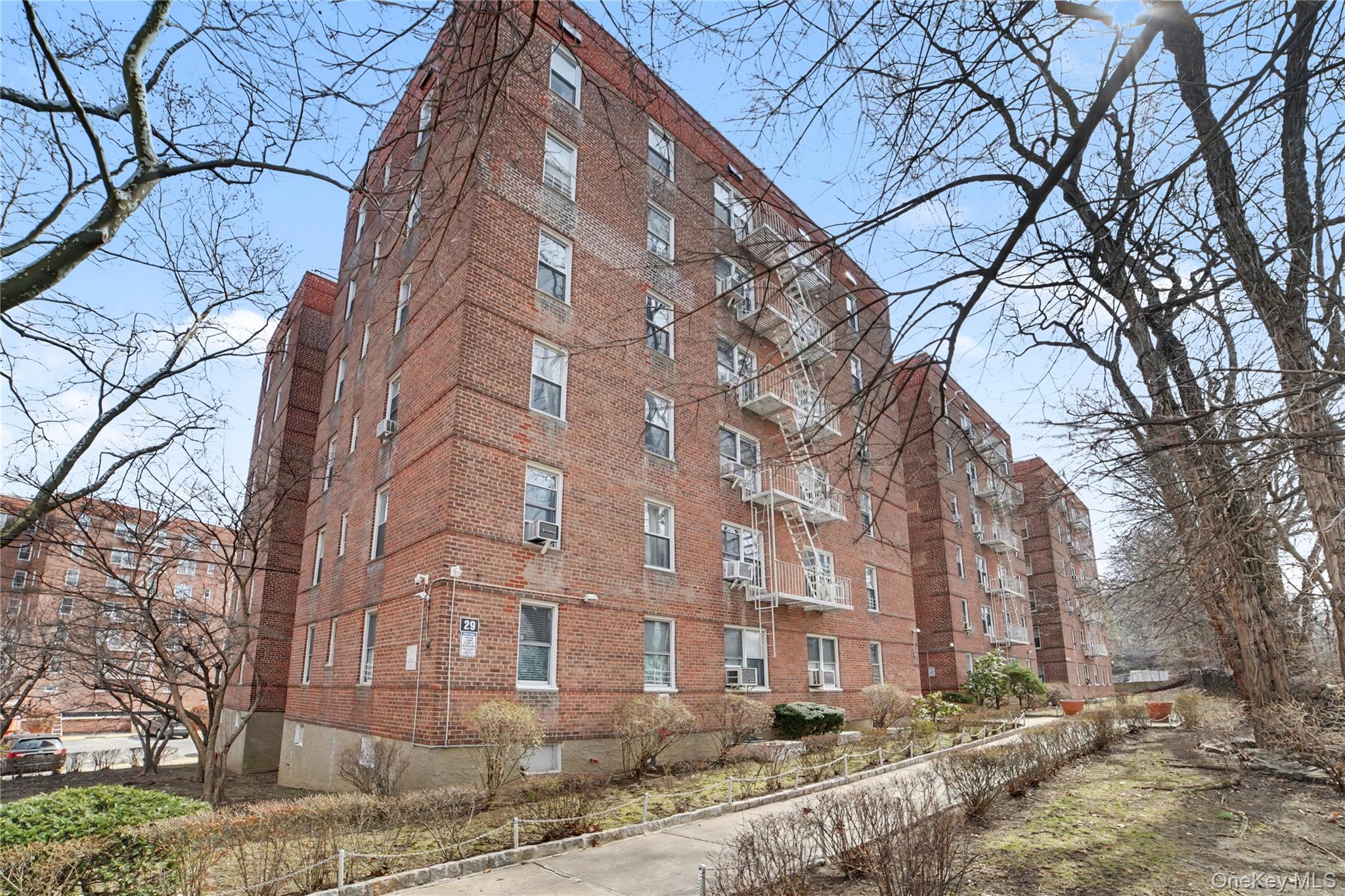 This bright and sunny corner co-op in the desirable Valentine Gardens...