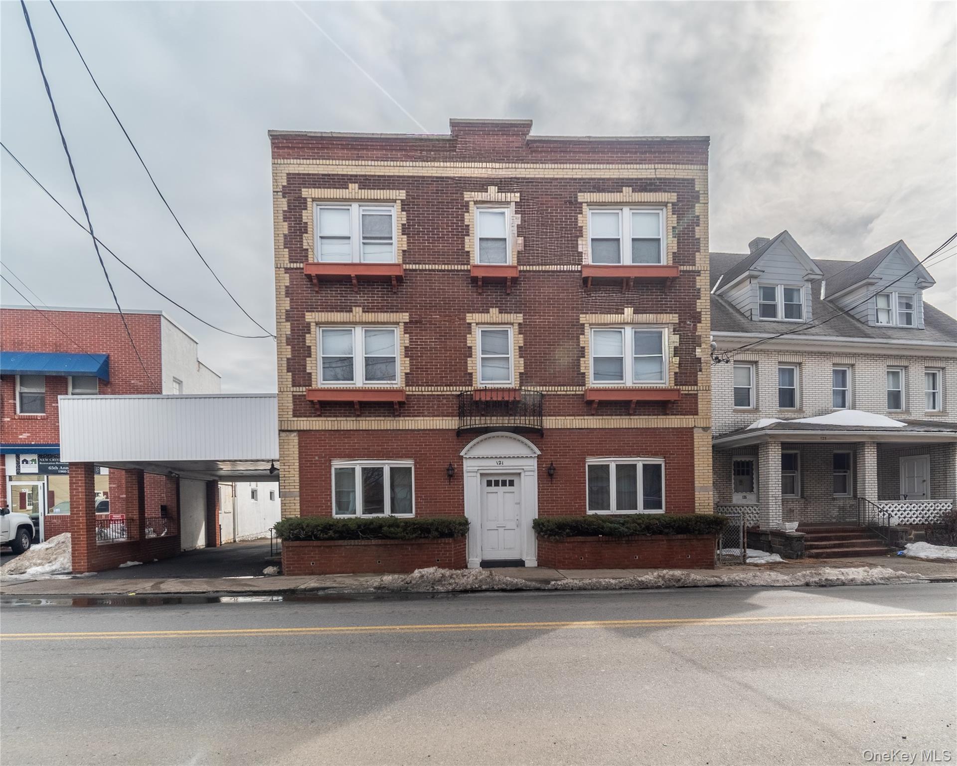 First time on Market. Three story stucco and brick building mixed use...