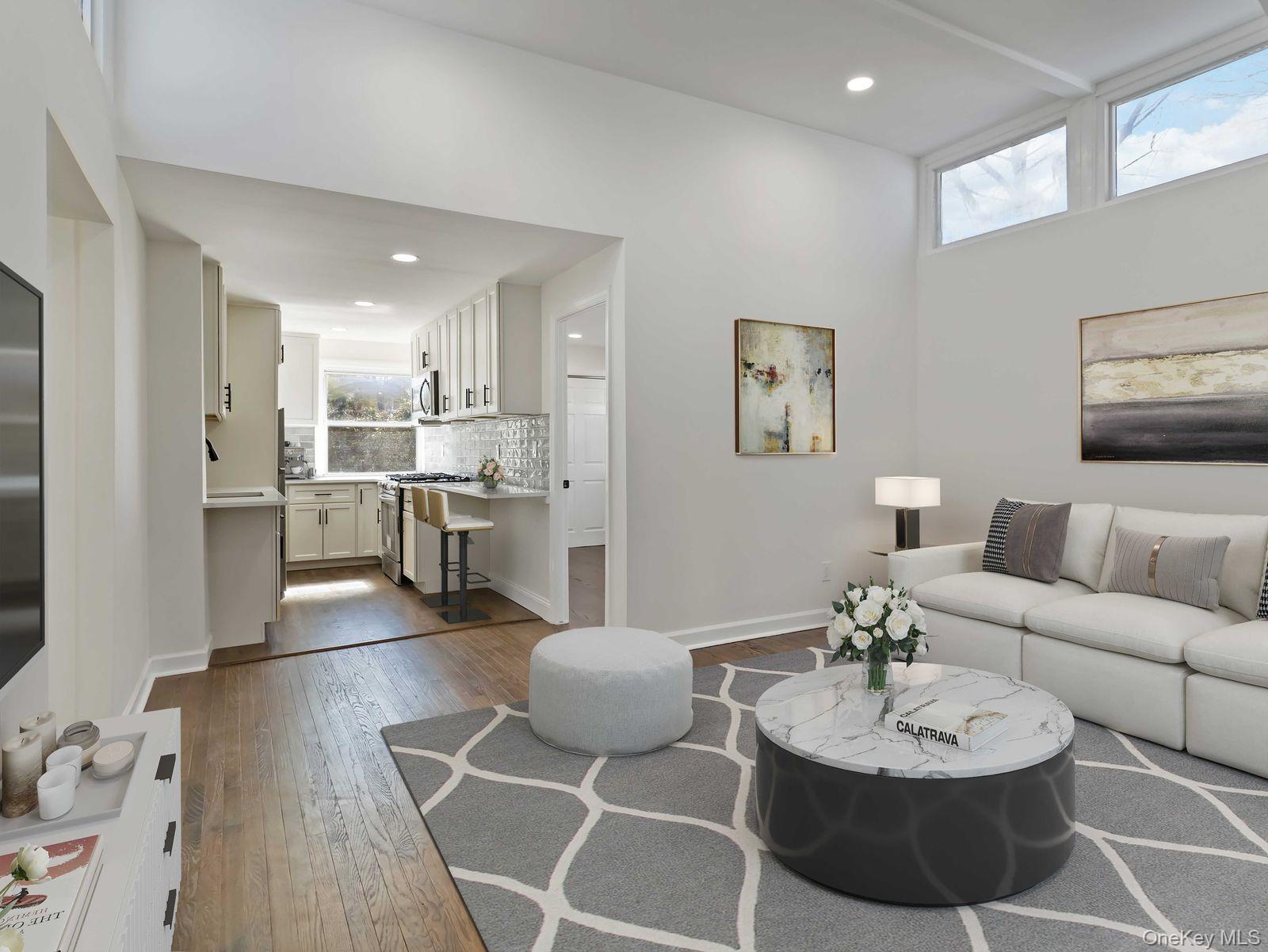 Welcome to this exquisitely renovated home in the sought after Woodlaw...