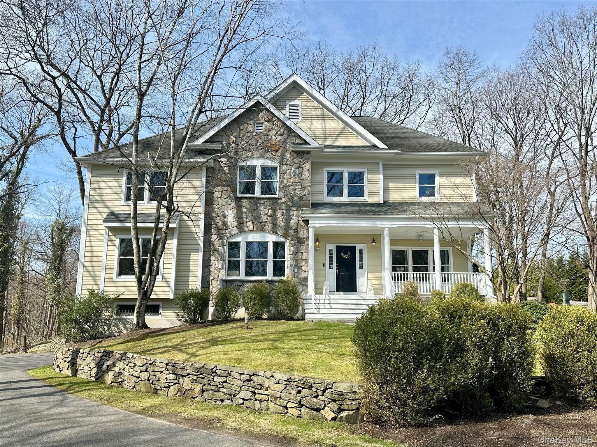 Modern, well-maintained 5-bedroom, 4.1-bath Colonial in Rye featuring...