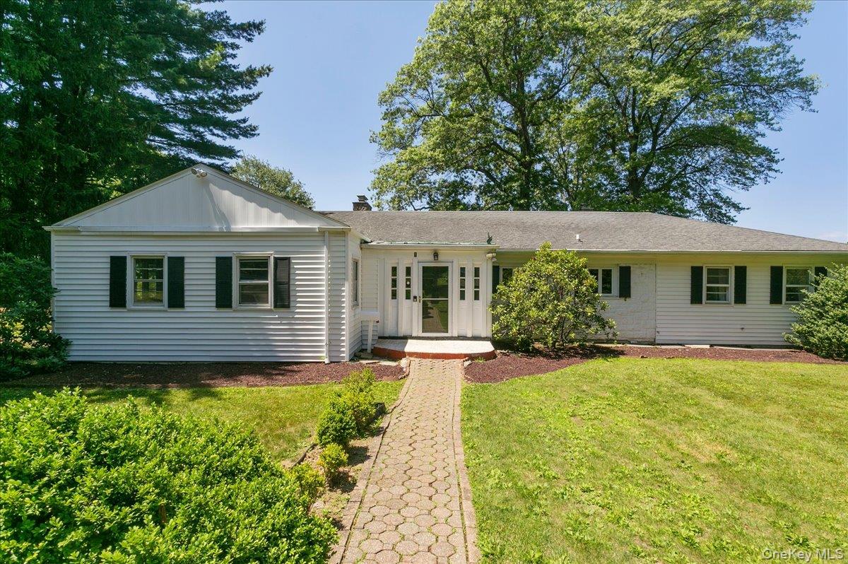 Welcome to this beautiful single-family ranch in the Orchard Hill neig...