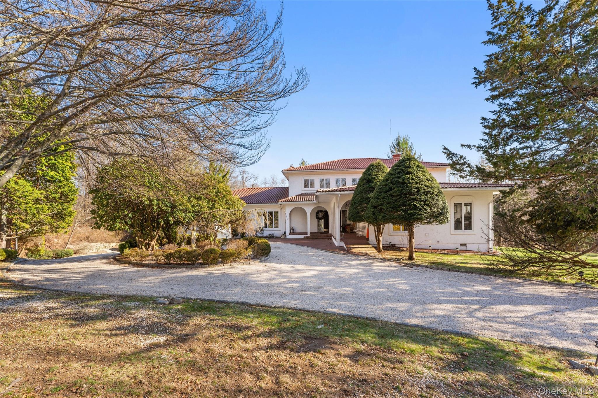 Step into a slice of Mediterranean paradise at 105 Cross Pond Road, wh...