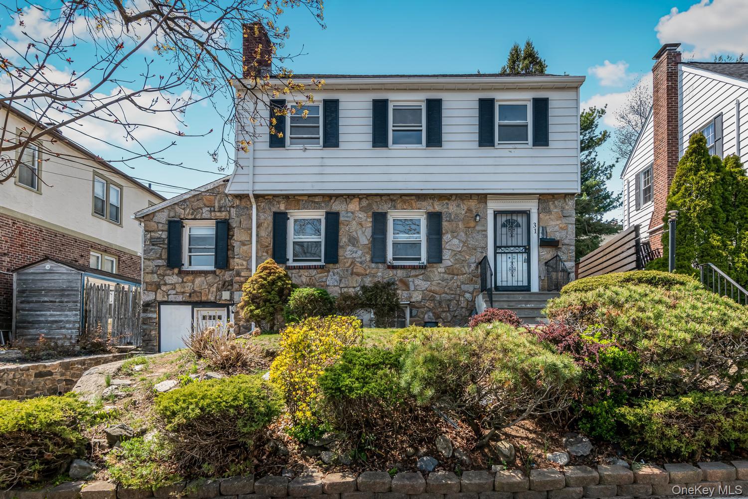 Welcome to 31 Emmett Place, a classic Colonial-style home offering tim...