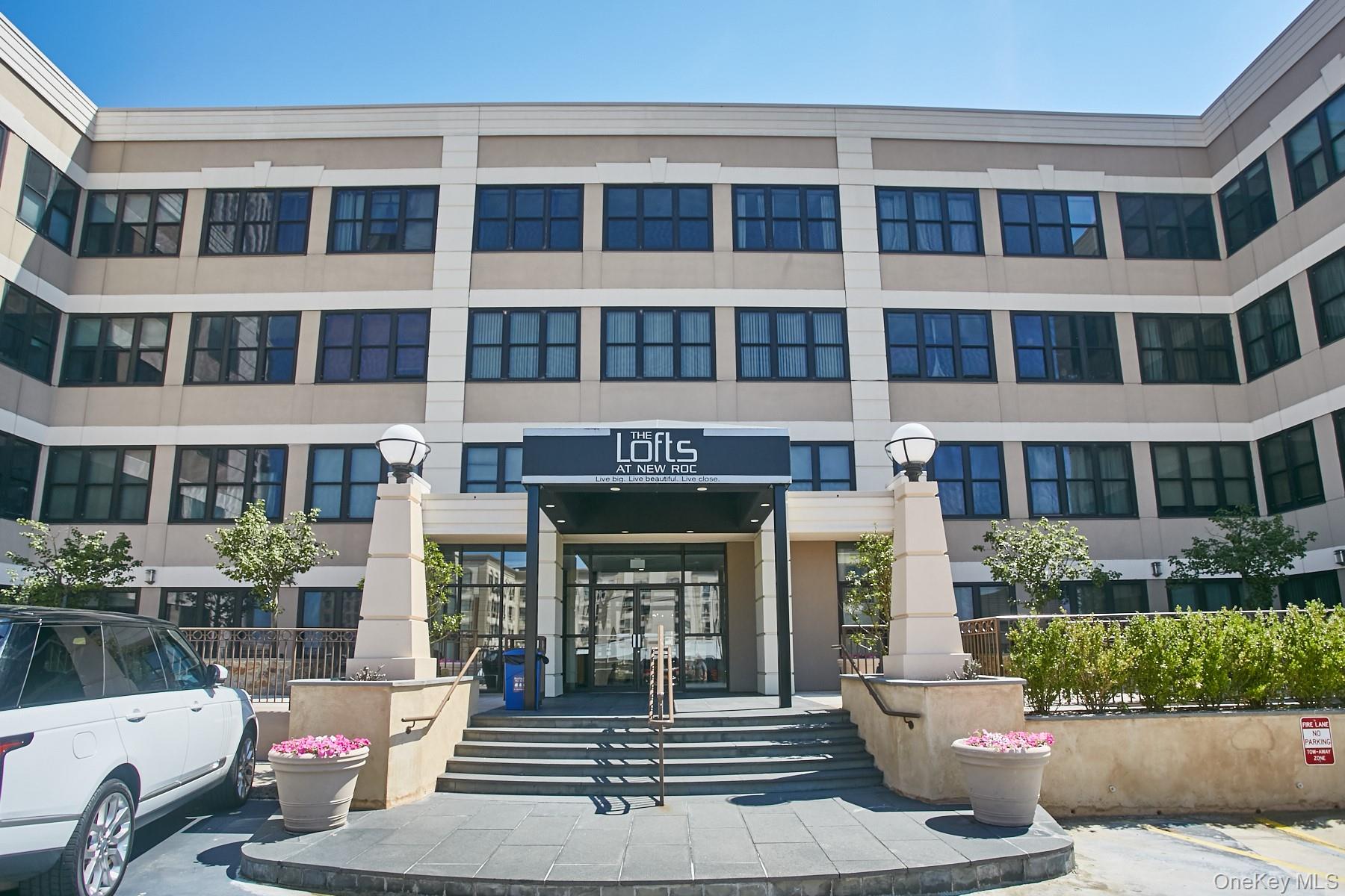 Welcome to The Lofts at New Roc, a stunning 2-bedroom, 2-bath corner u...