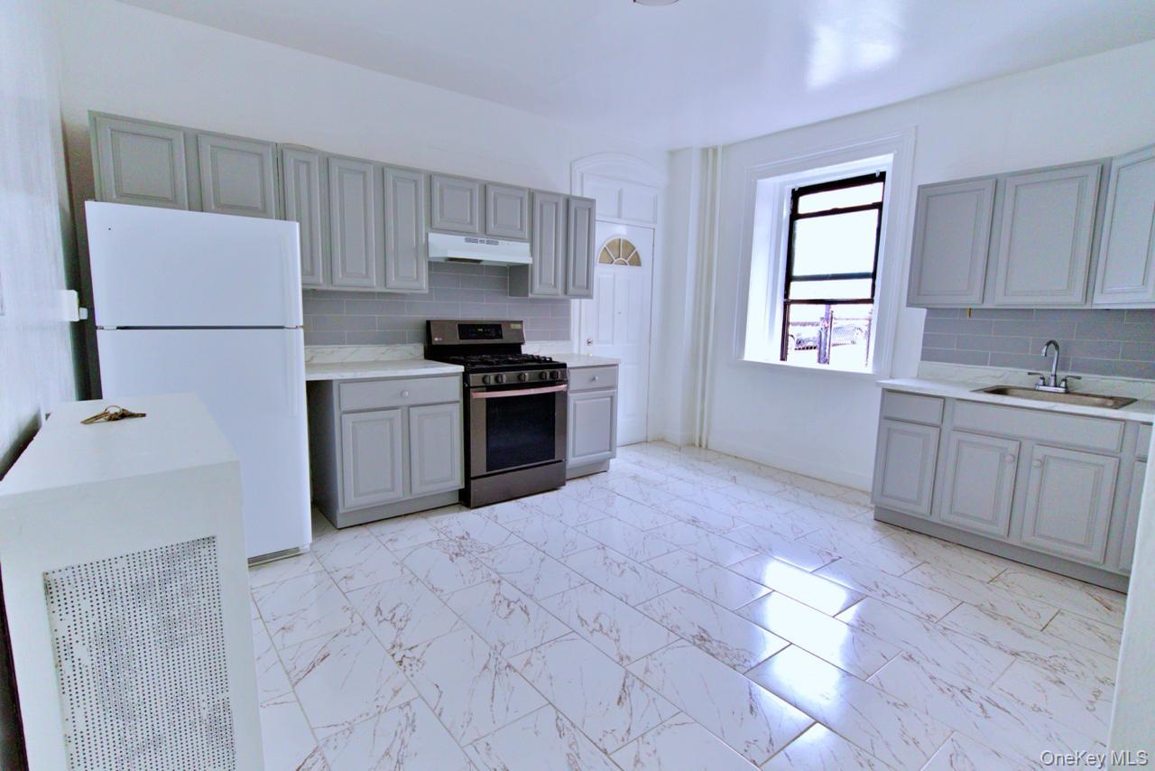 Step into this meticulously renovated 3-bedroom residence, where conte...