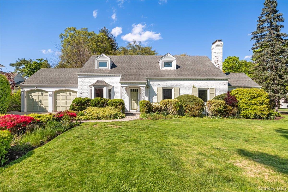 Charming Center Hall Colonial nestled in the highly desirable Strathmo...