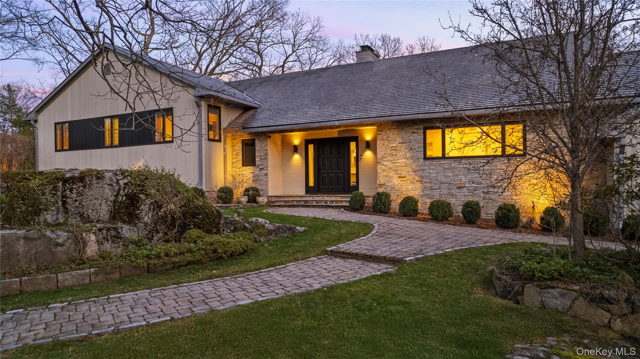 Set on a full acre in the prestigious Sterling Ridge section of Harris...