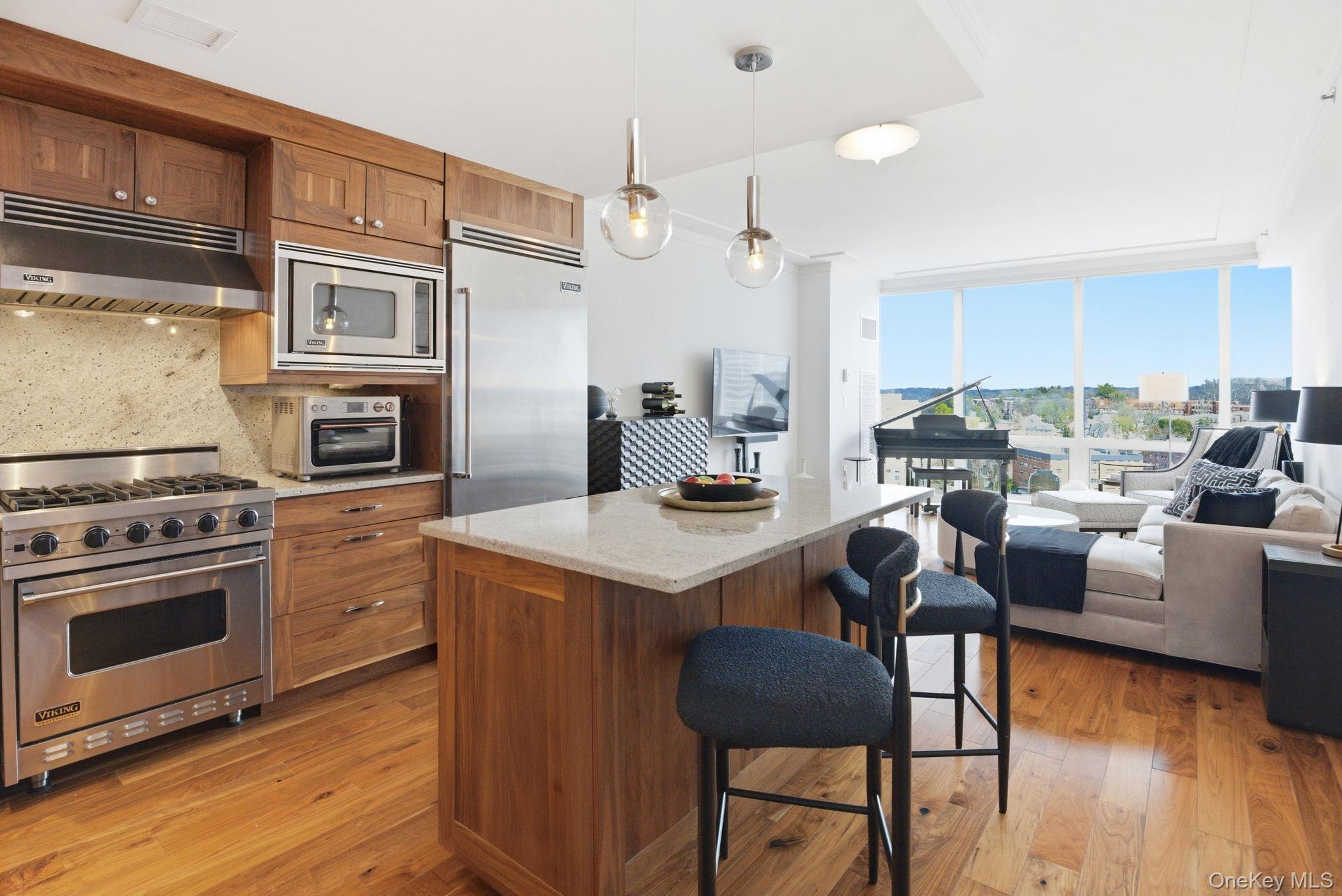 Residence 15C at The Ritz Carlton Residences is a study in refined liv...