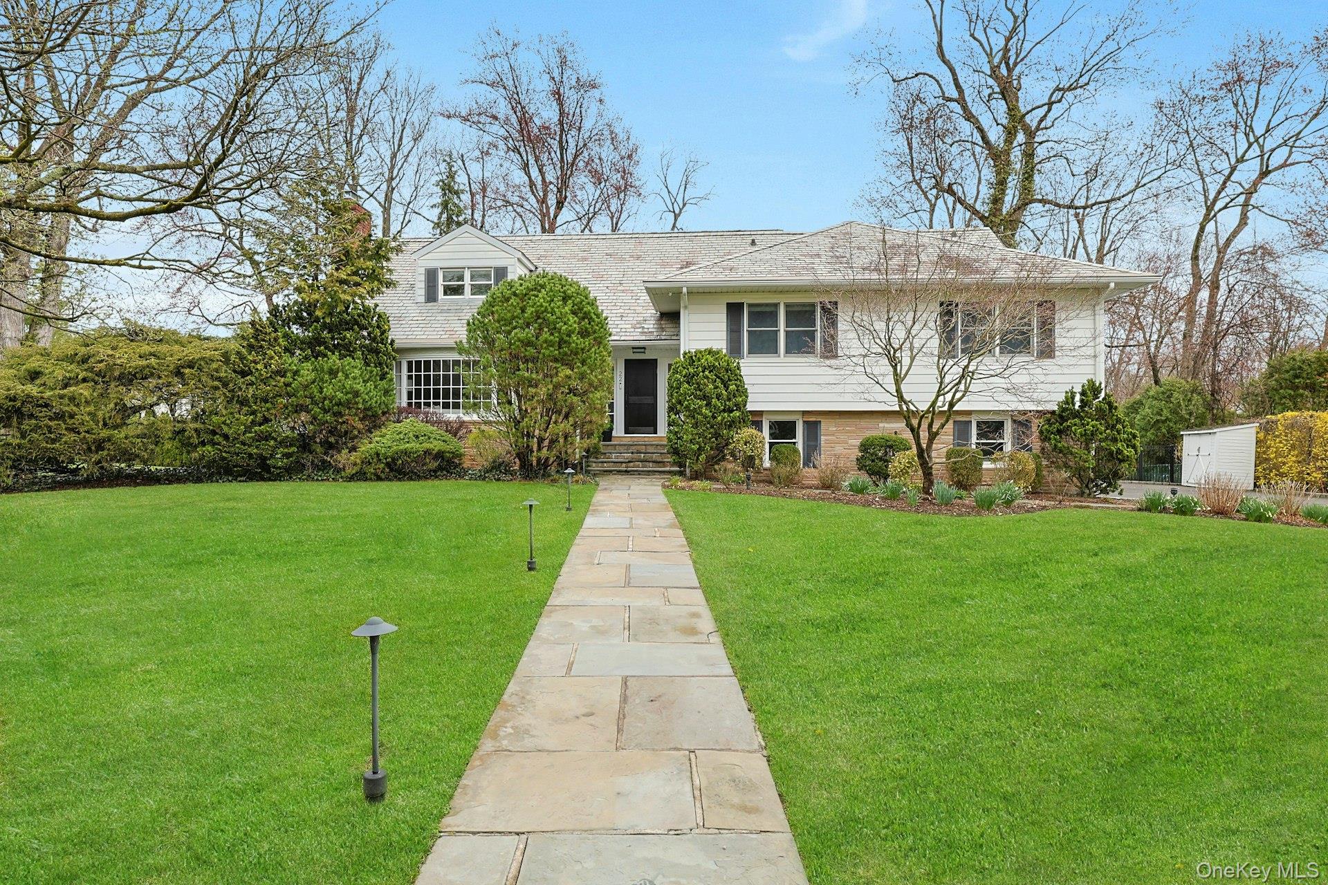 Welcome to 22 Leatherstocking Lane, an elegantly reimagined split-leve...