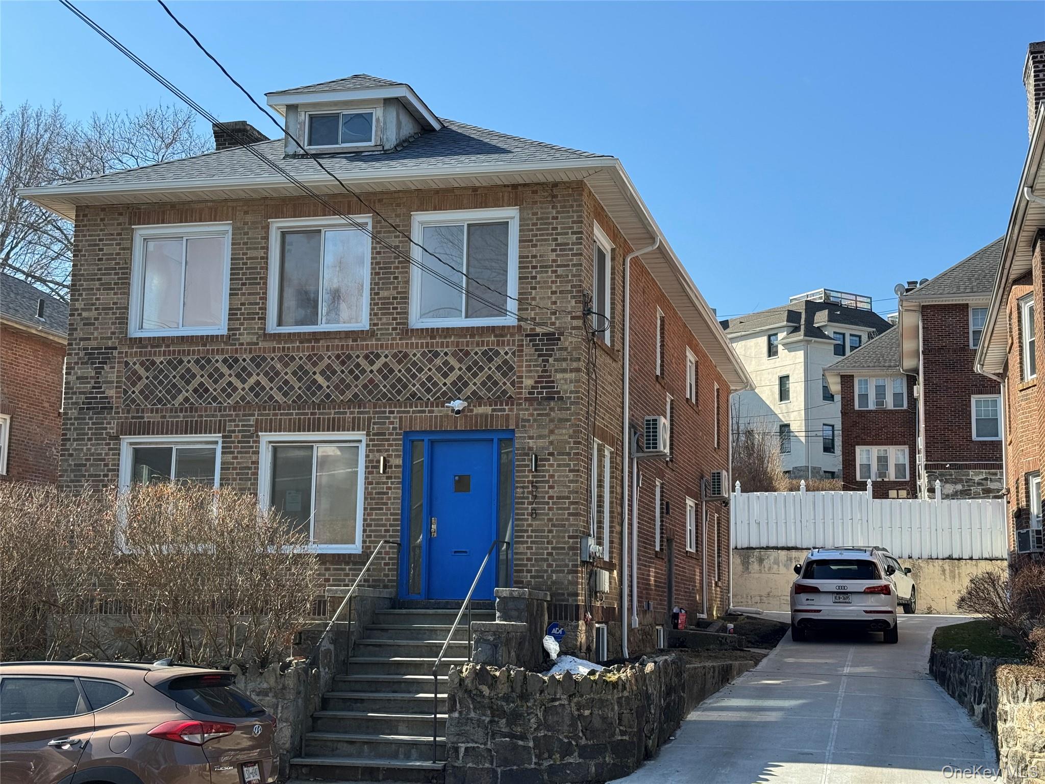PRE-WAR BRICK TWO-FAMILY A rare full-brick pre-war two-family with tim...