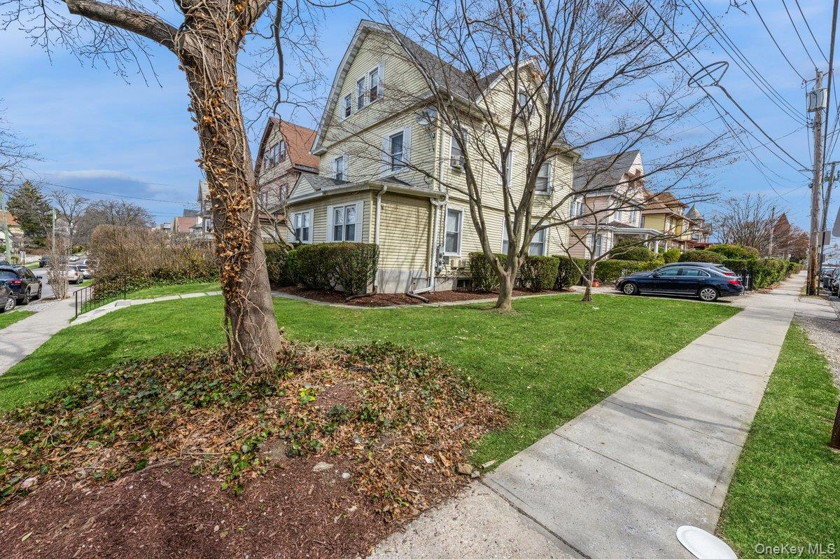 Welcome to this exceptional Three-Family property that blends space, c...