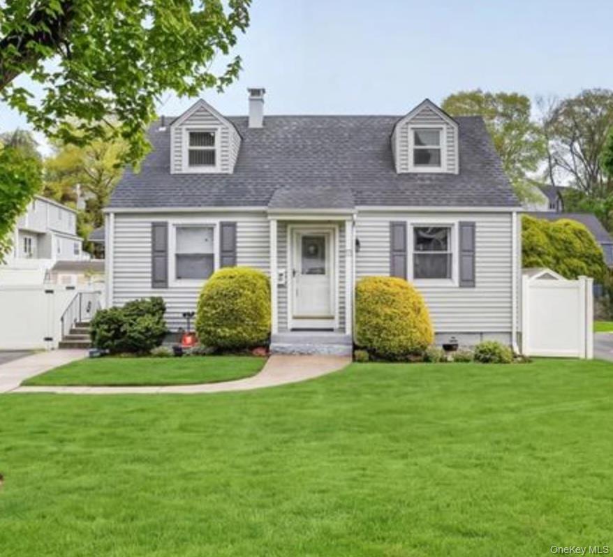 Welcome to 5 Cantitoe Road, a charming Cape Cod home nestled in one of...
