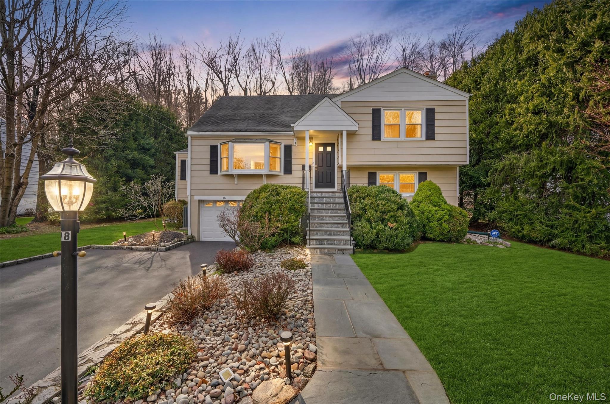 Discover this beautifully updated and meticulously maintained split-le...