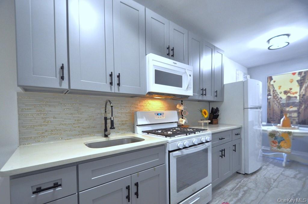 Fully Renovated Corner Two Bedroom!  This spectacular home features a...