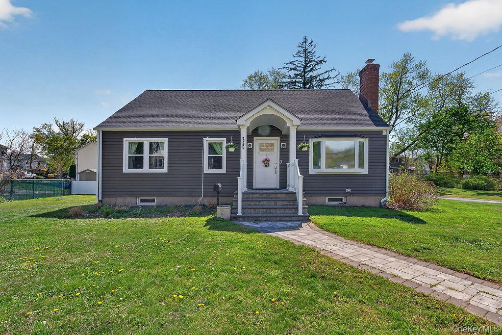 Welcome to this beautifully updated cape-cod in the Village of Mamaron...