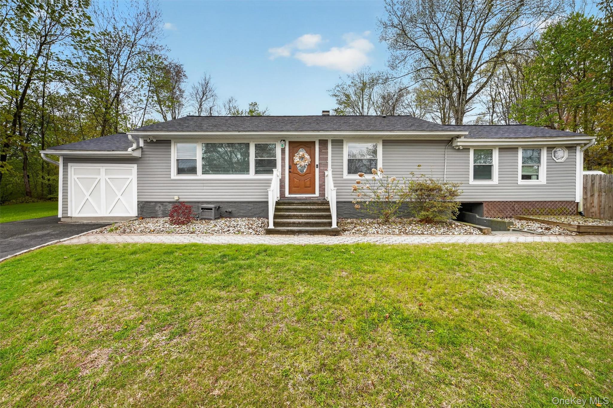 Easy one level living in this beautifully updated ranch-style home, pe...
