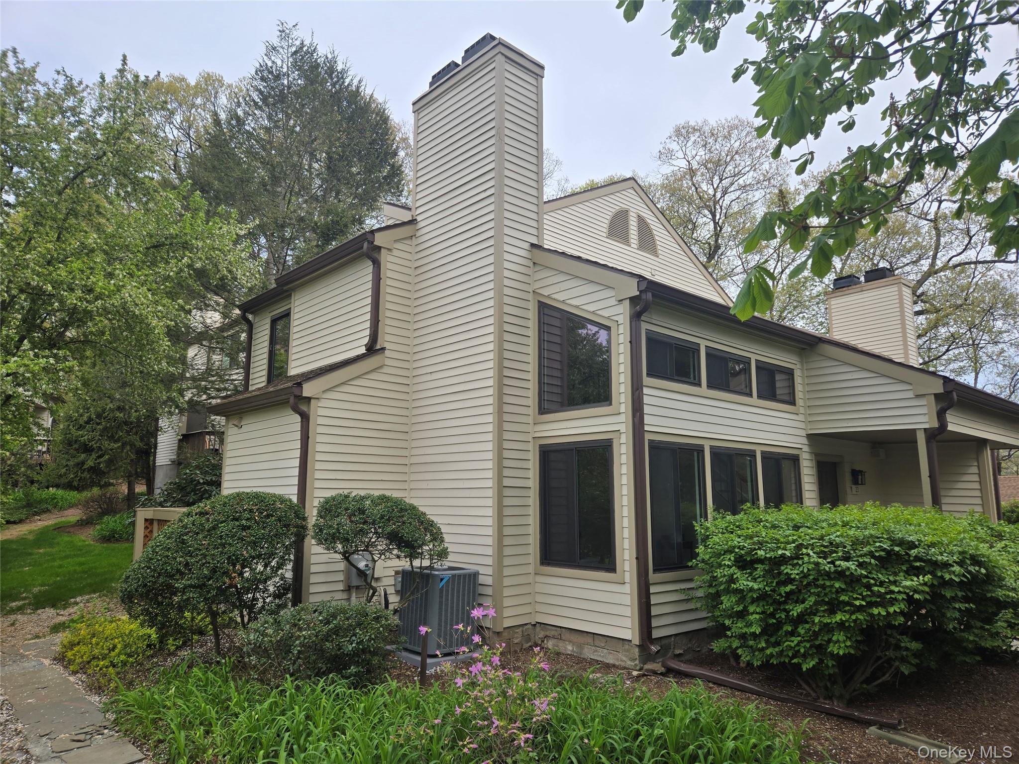 Stylishly Renovated 1-Bedroom Condo with Loft, Garage & Resort-Style A...