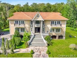This Prime Bedford Estate, built in 2005, is on over 9 acres of open,...