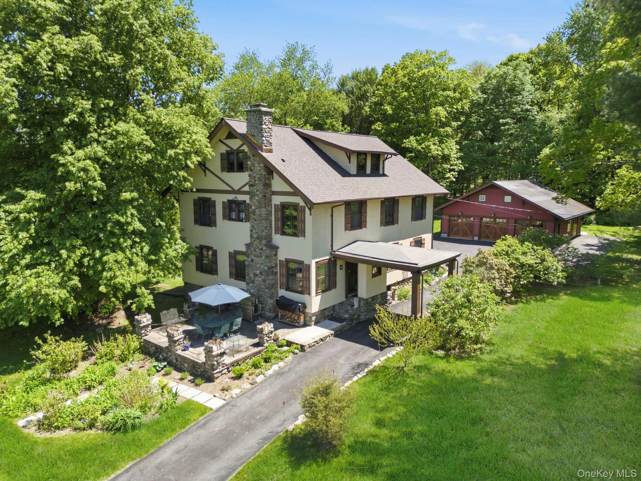 This meticulously restored arts and crafts style home beckons the most...