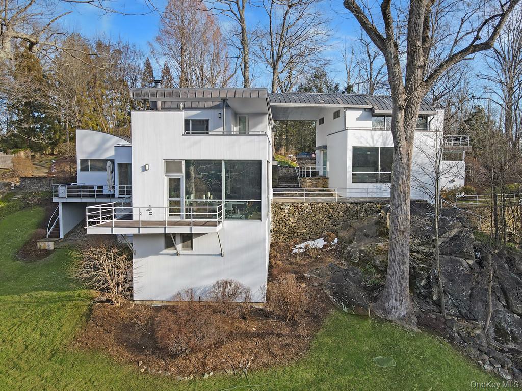 A published, site-specific modern residence designed by Frank Lupo and...