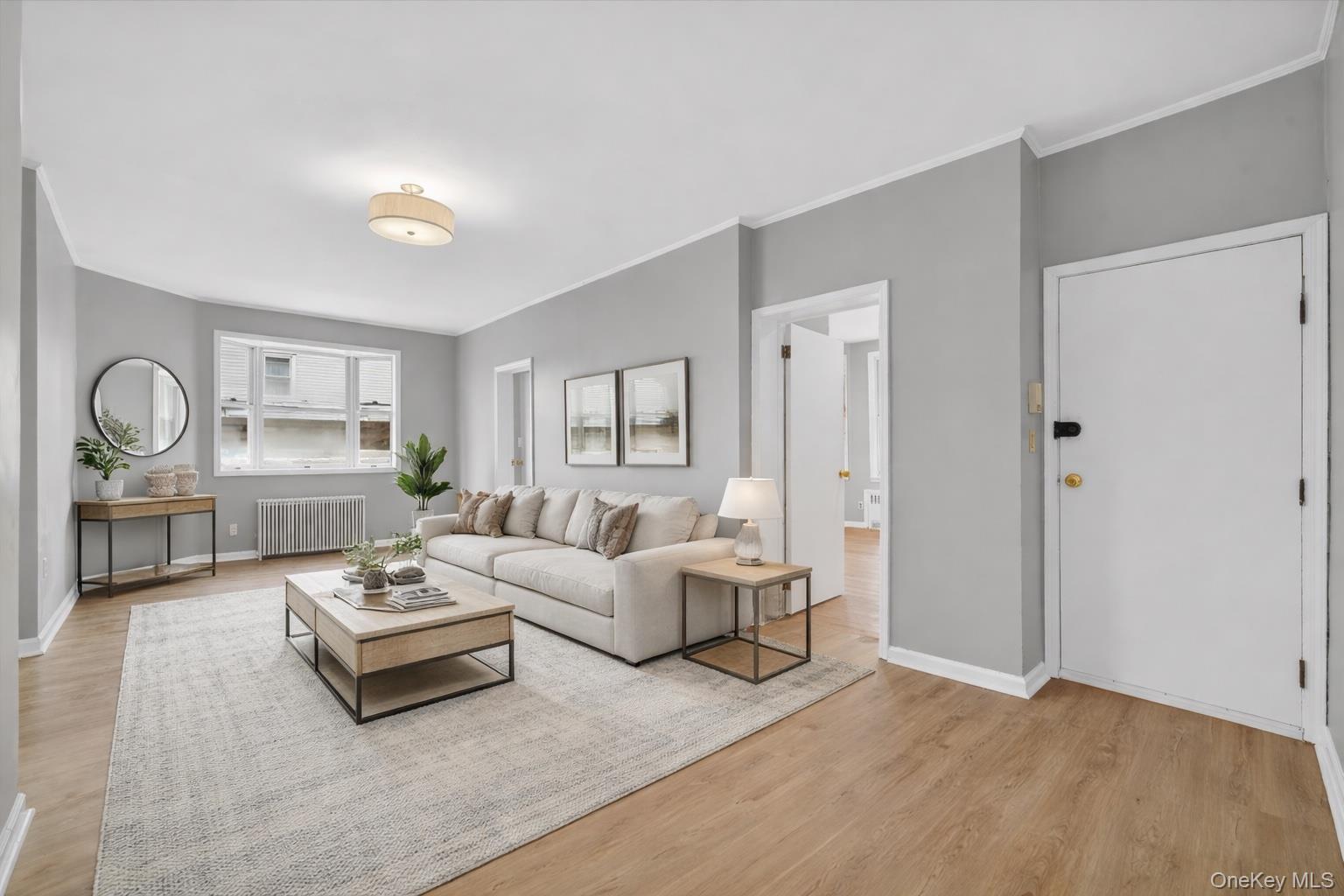 Need space? This oversized first-floor residence offers the feel of a...