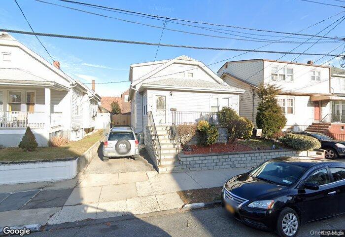 This charming multi-family home at 31 Huber Place in Yonkers, NY offer...