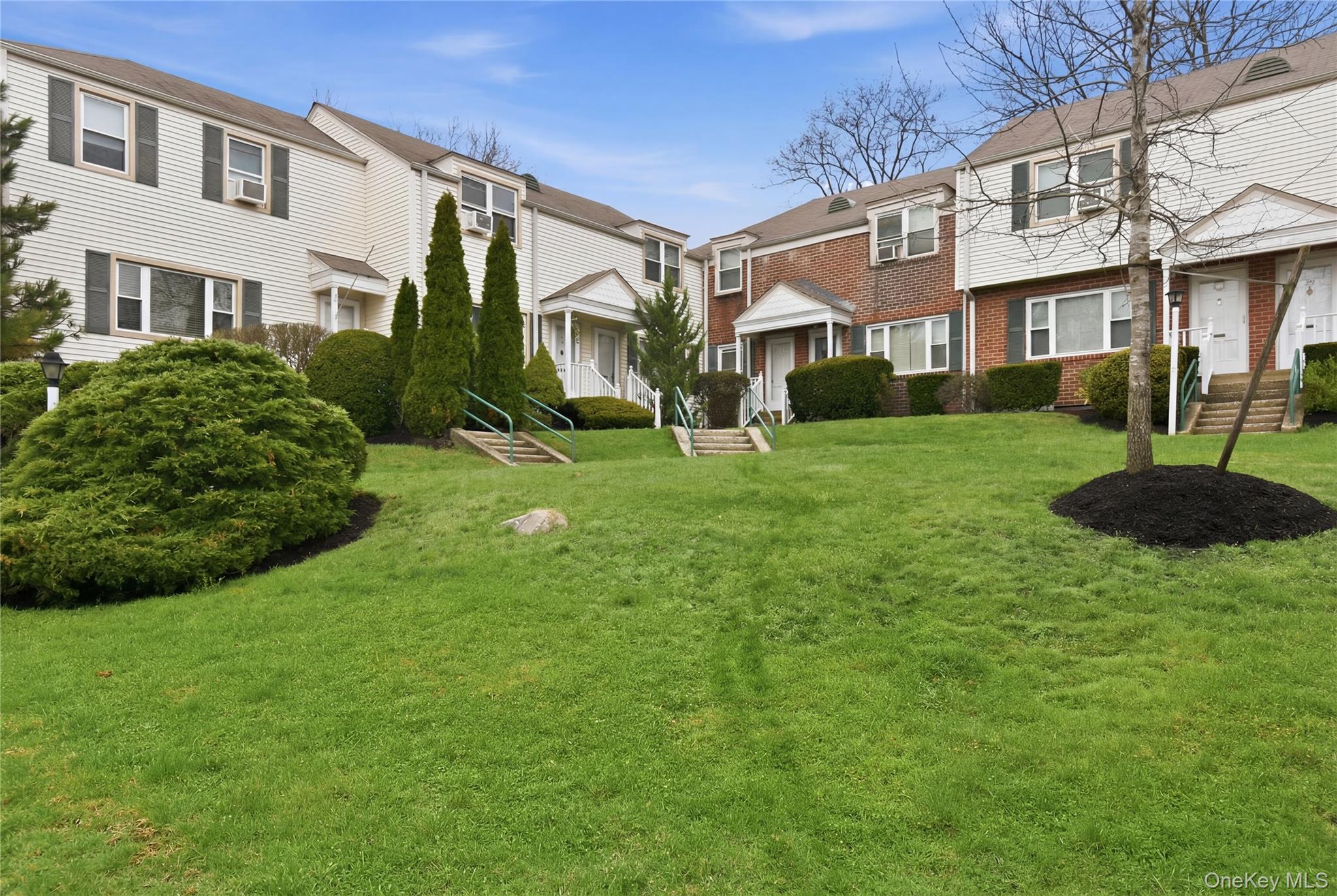 Bright, sun-filled and beautifully maintained, this spacious 2-level o...