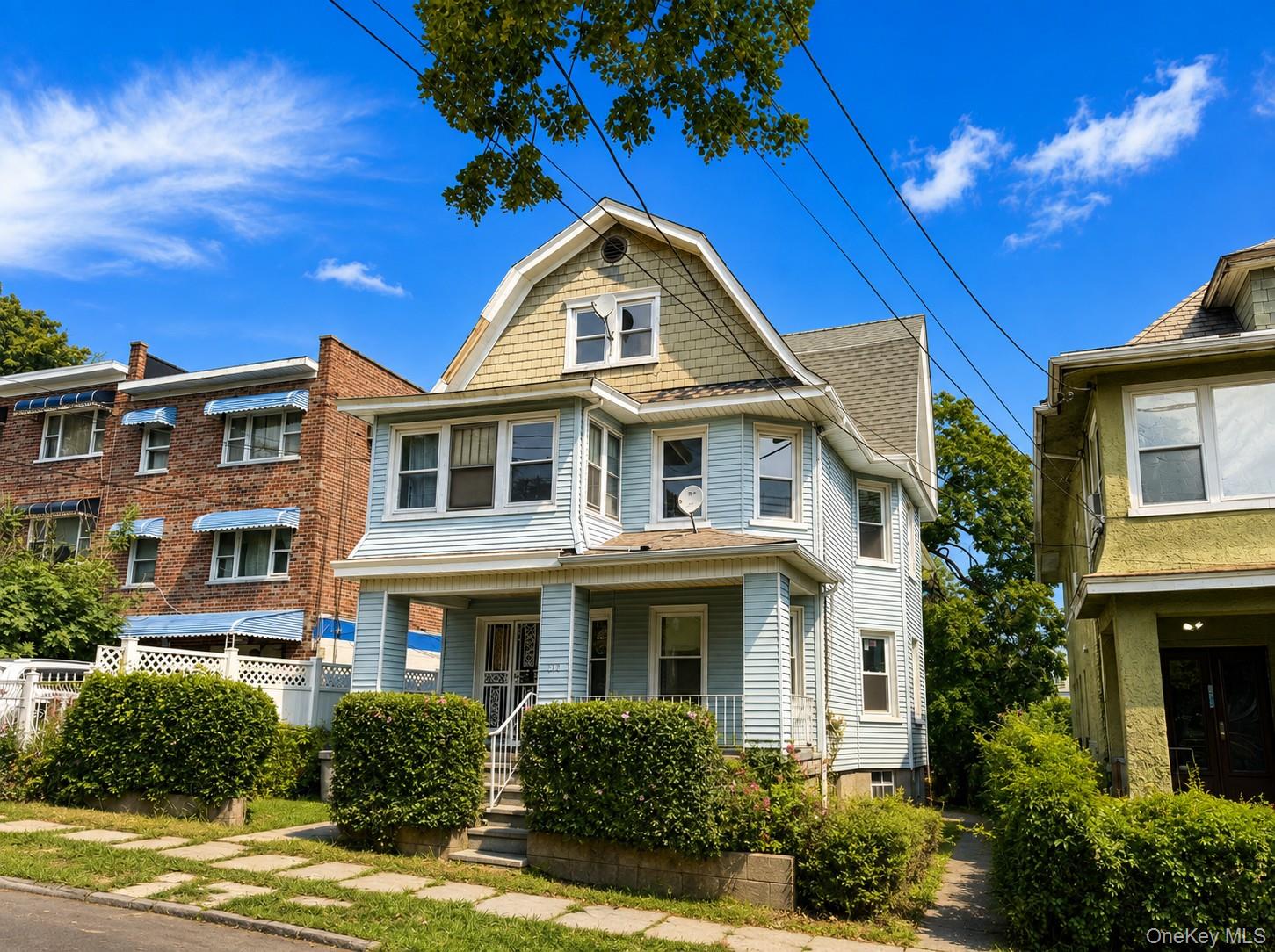Discover the potential of this spacious pre-war Colonial-style three-f...