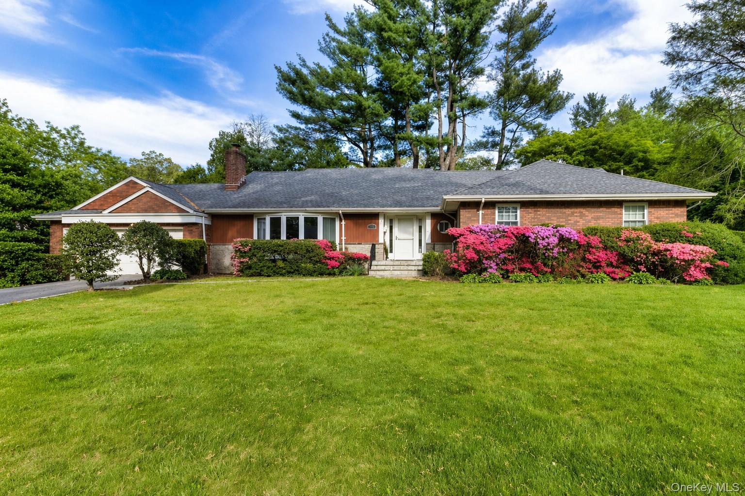 Spectacular sun filled renovated Scarsdale home set on 0.37 acres on a...