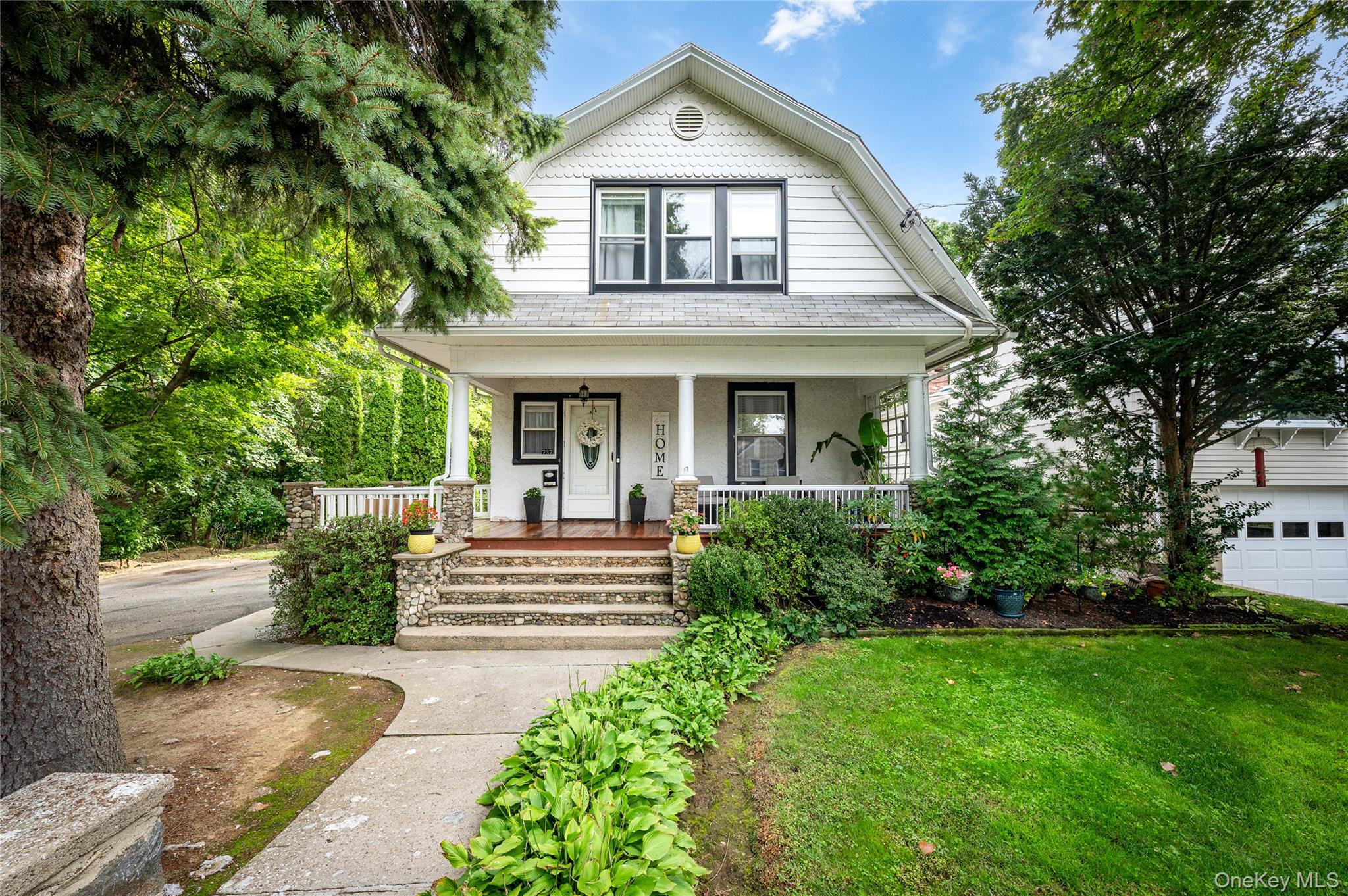Renovated Dutch Colonial on a tree-lined street near the Village of Ma...