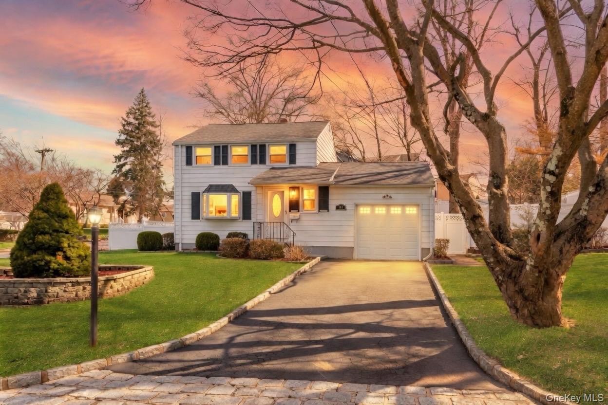 Welcome to 260 Round Hill Drive—a charming Colonial in the sought-afte...