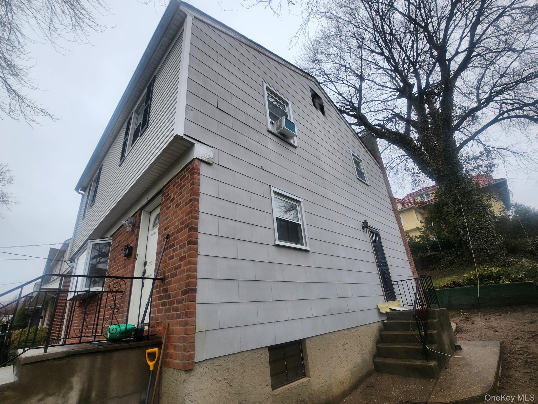 Single-Family detached brick house kitchen, dining room and living roo...