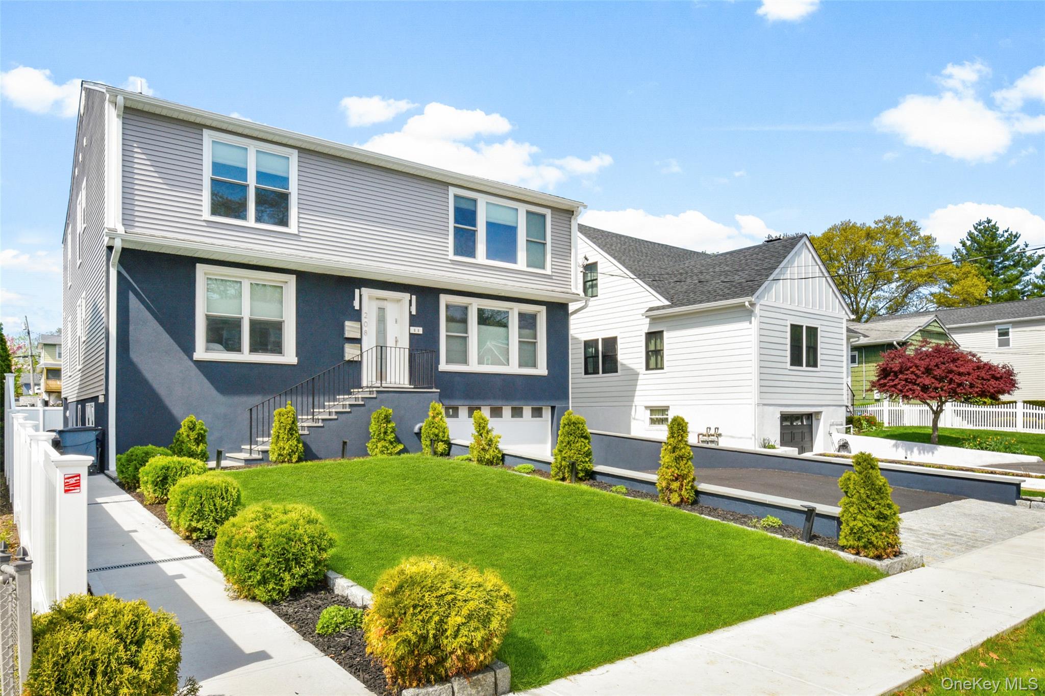 Exceptional opportunity to own a completely updated two-unit residence...