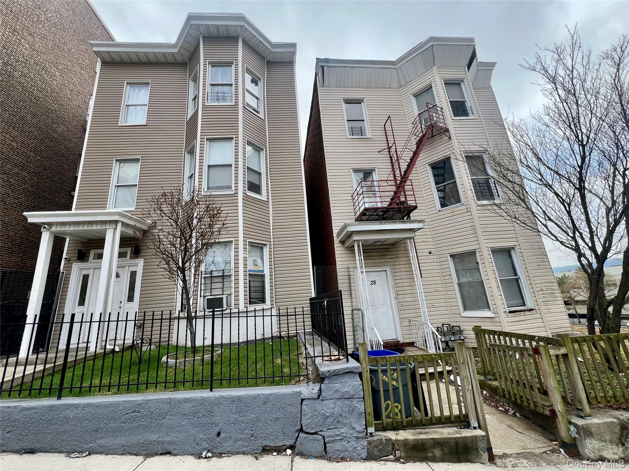 Multi-Family house for sale. Package deal with 30 Ashburton Ave. Land...