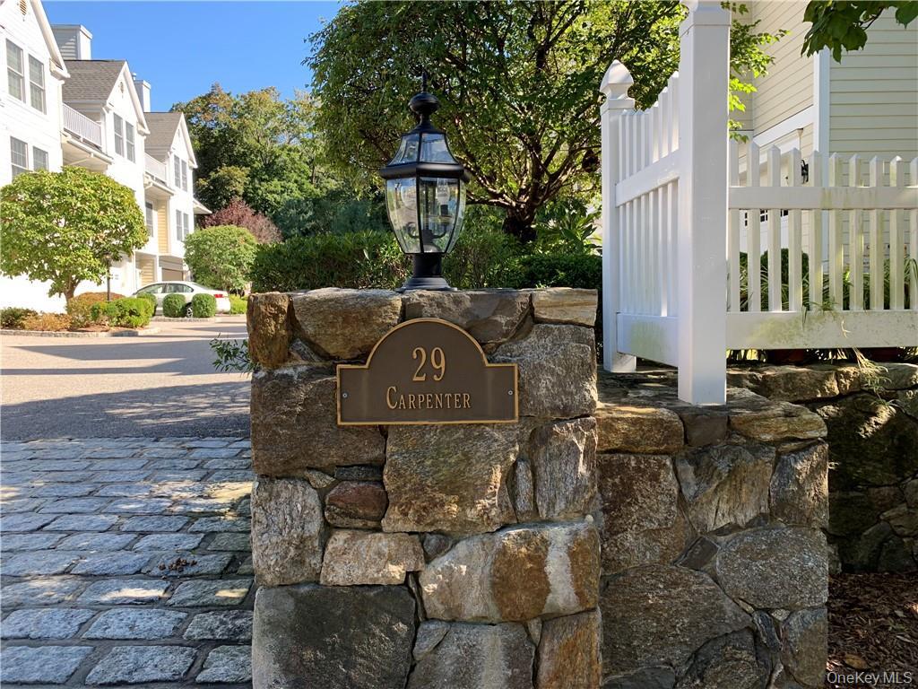 Hilltop Commons presents this beautifully updated two-level end-unit c...