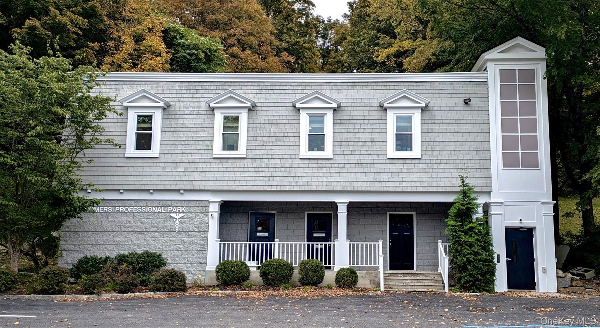 A fully occupied two-story commercial building offering immediate inco...