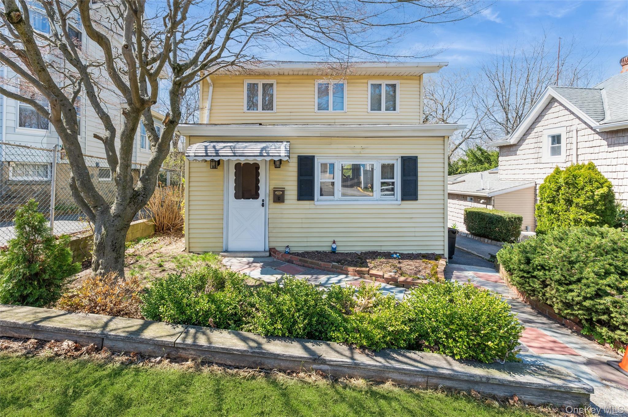 Step into the storybook charm of 18 South Washington Avenue, a beautif...