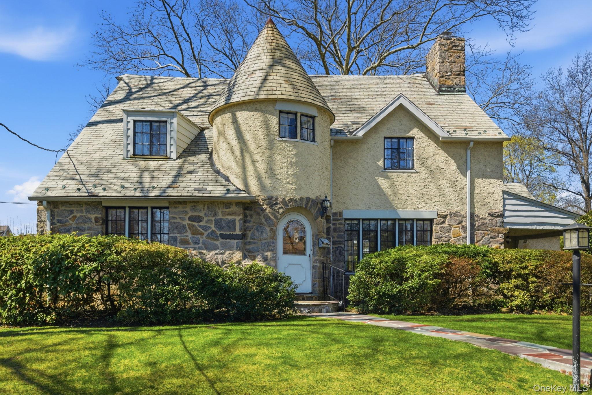 Nestled on a quiet, tree-lined street in the highly sought-after Gedne...