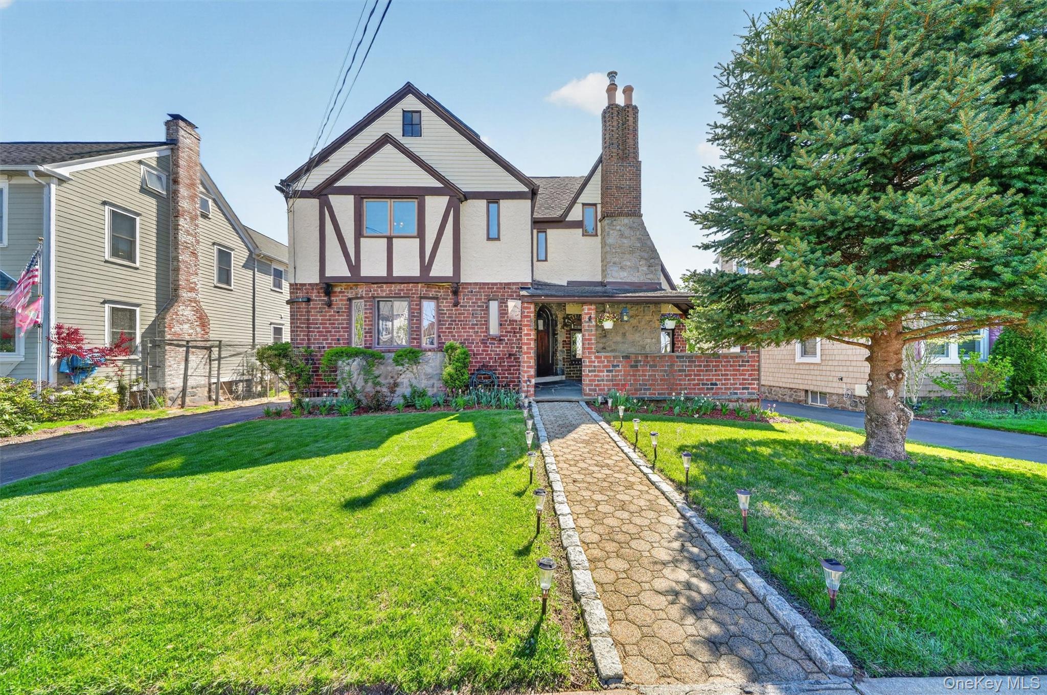 Beautiful Tudor-style home offering timeless charm, architectural char...