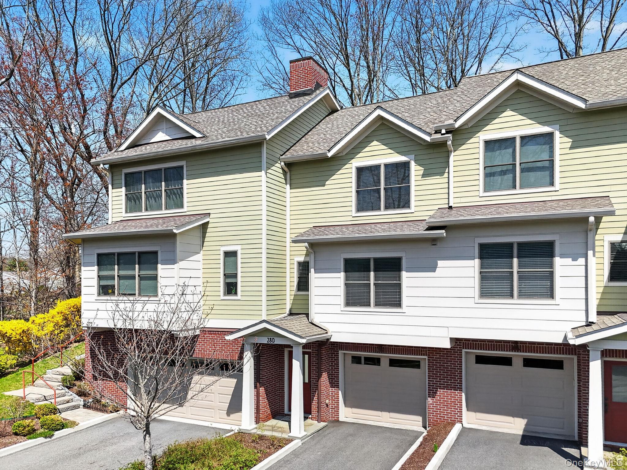 Tucked into a picturesque wooded hillside in sought after South Salem,...