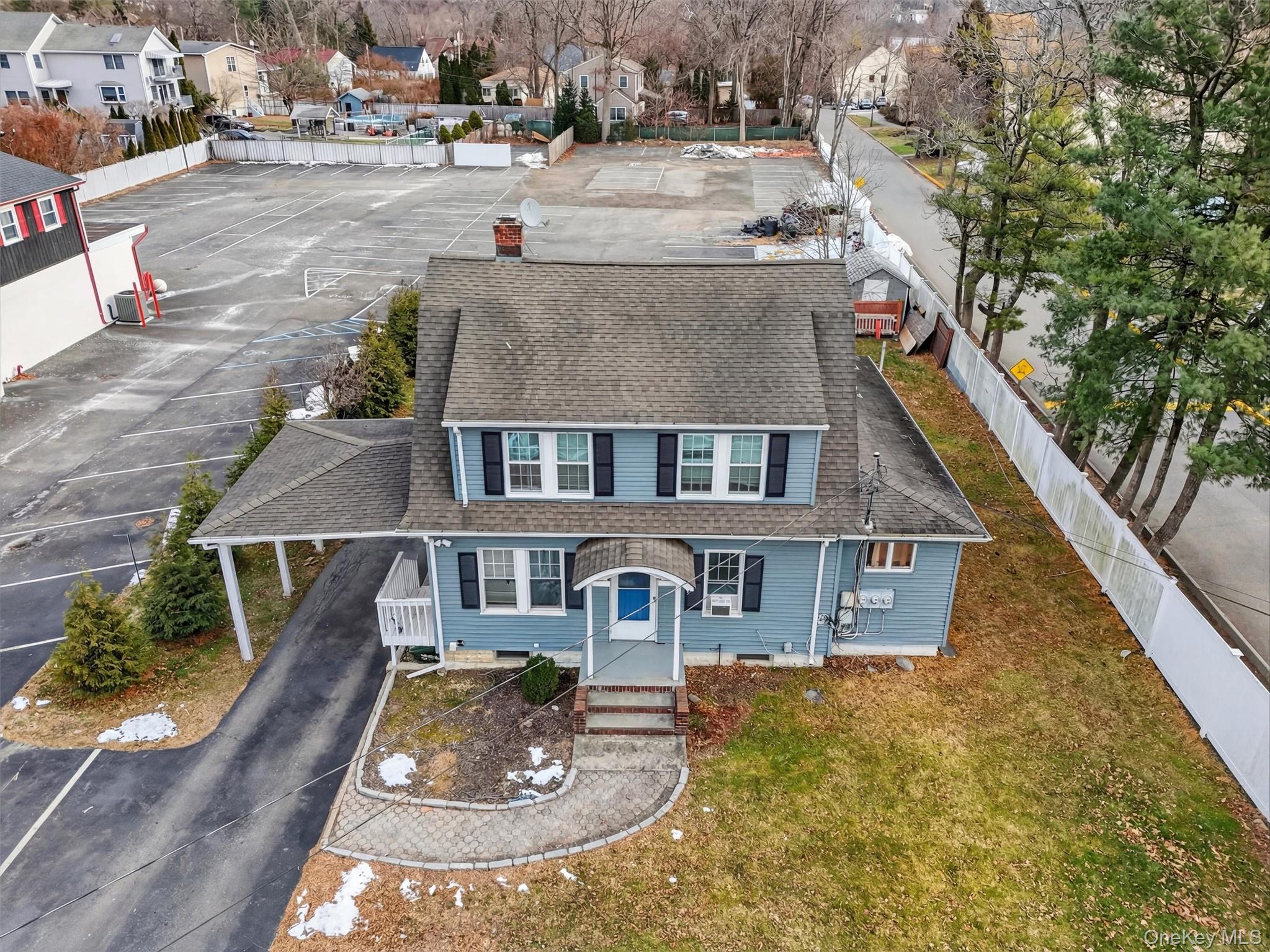 Unique 2-Family Property with Commercial Potential!  This 2-family hom...