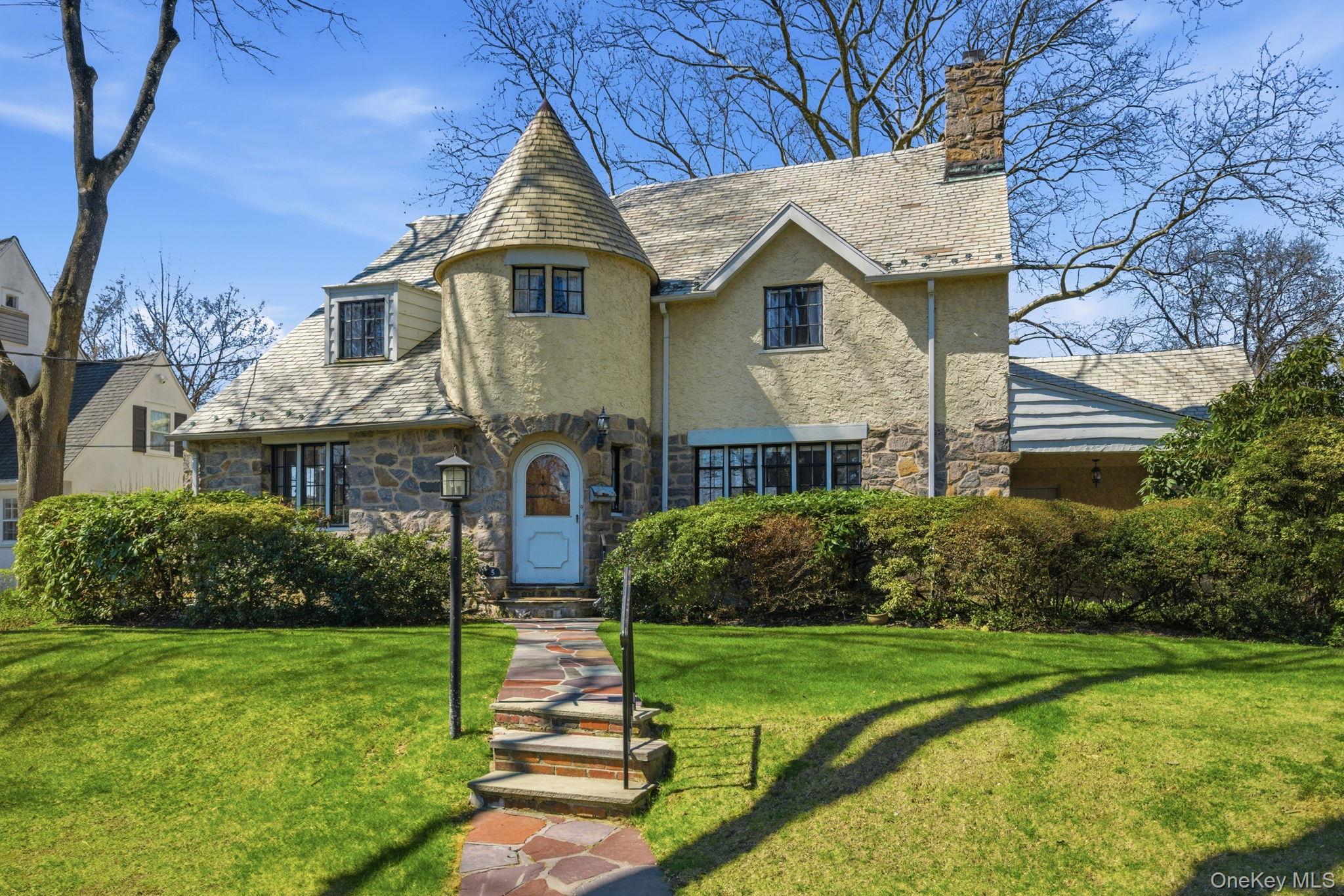 Nestled on a quiet, tree-lined street in the highly sought-after Gedne...