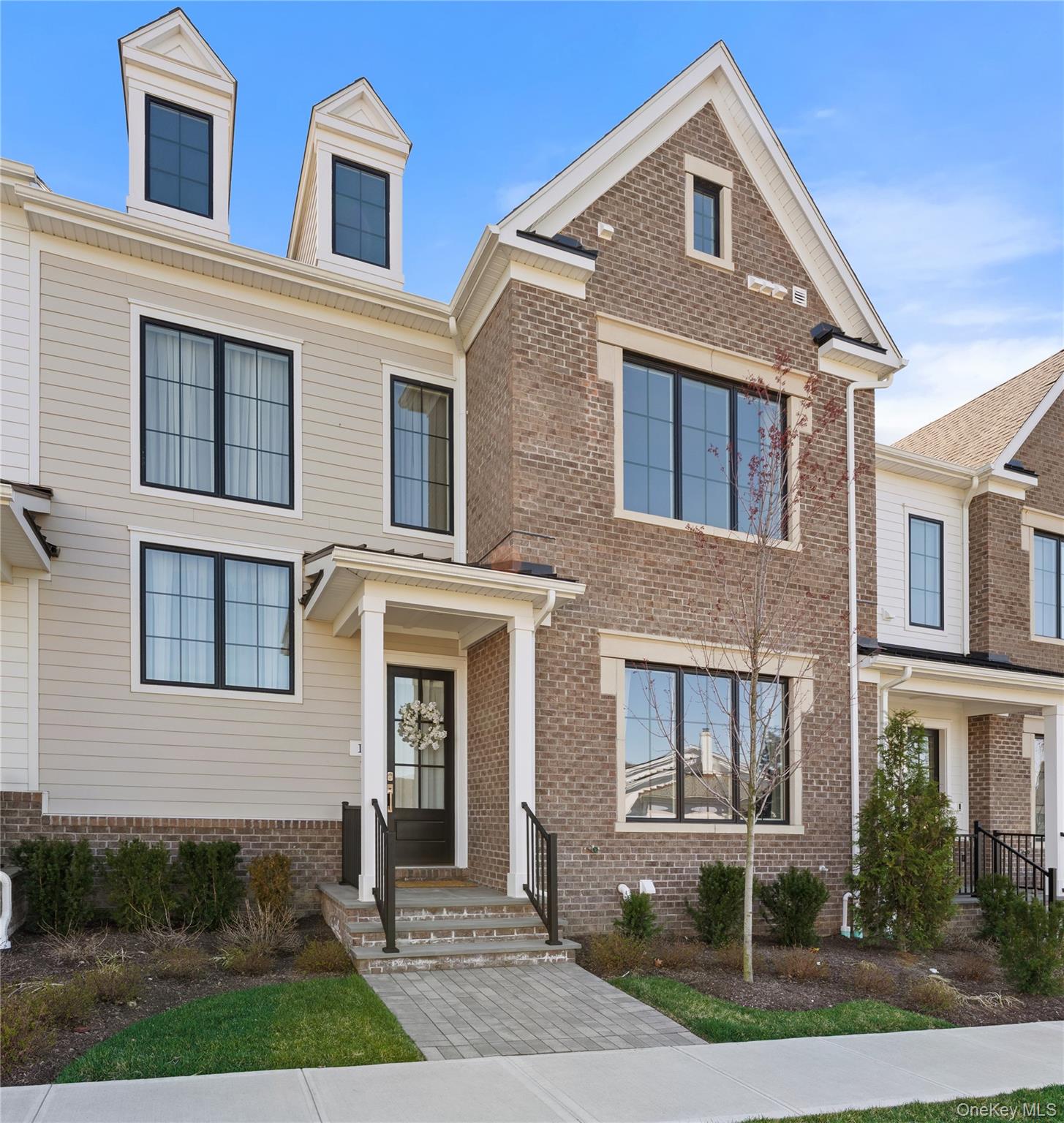 Welcome to this sophisticated carriage home at 17 Lila Lane, offering...
