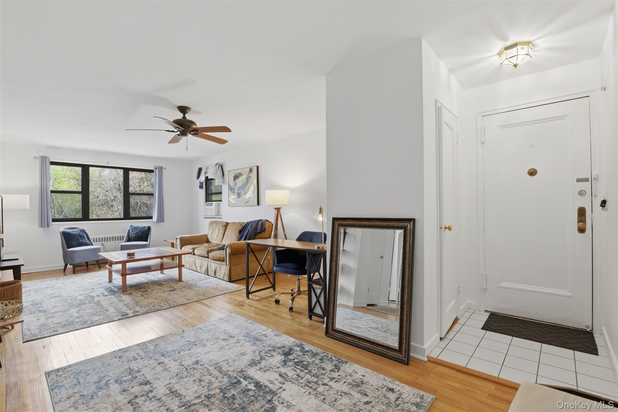 Situated in vibrant Tarrytown Village, this impeccably maintained uppe...