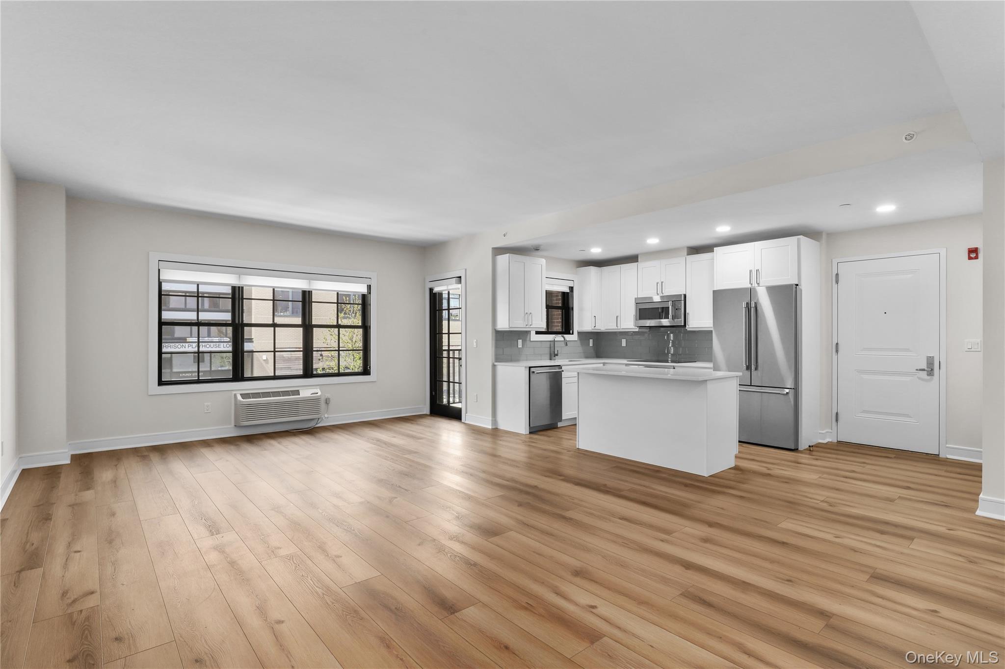 Welcome to The Townhouse on Purdy- a stylish brick building tucked awa...