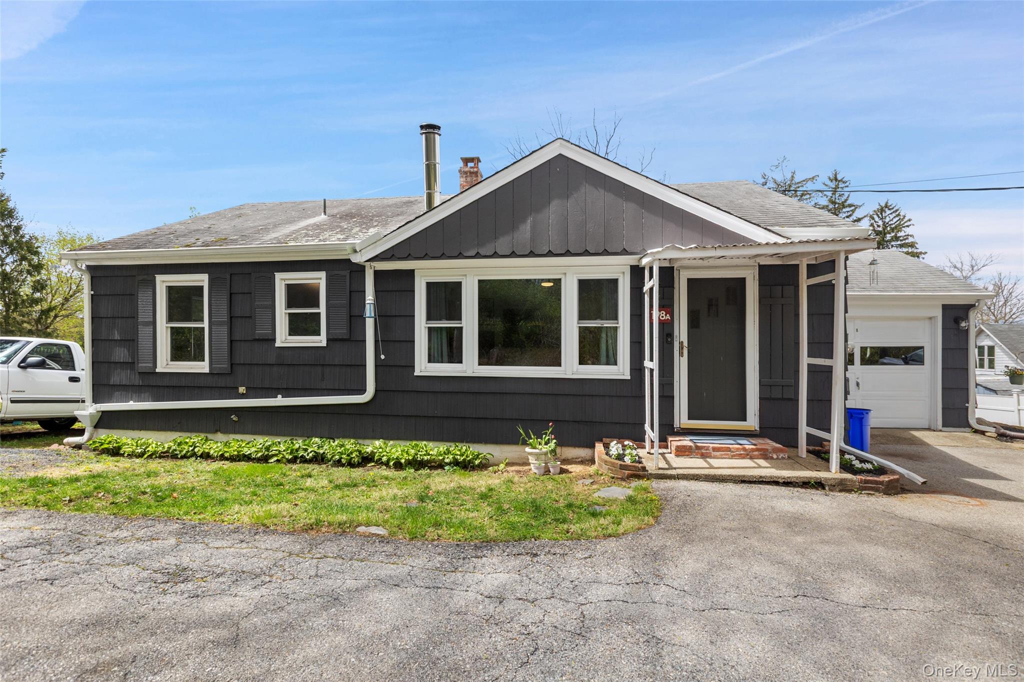 Welcome to this charming home offering the ease of one-level living in...