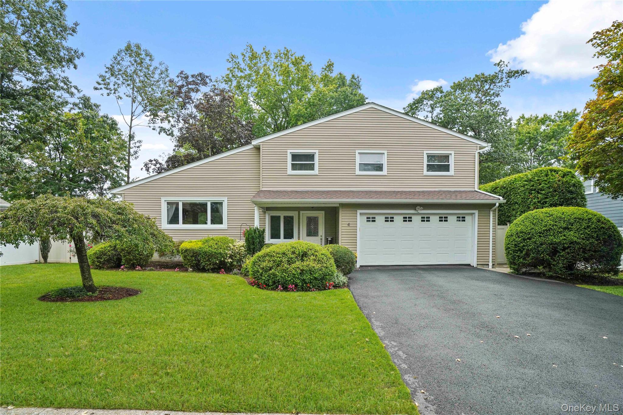 Meticulously maintained split-level home in the highly sought-after Ar...