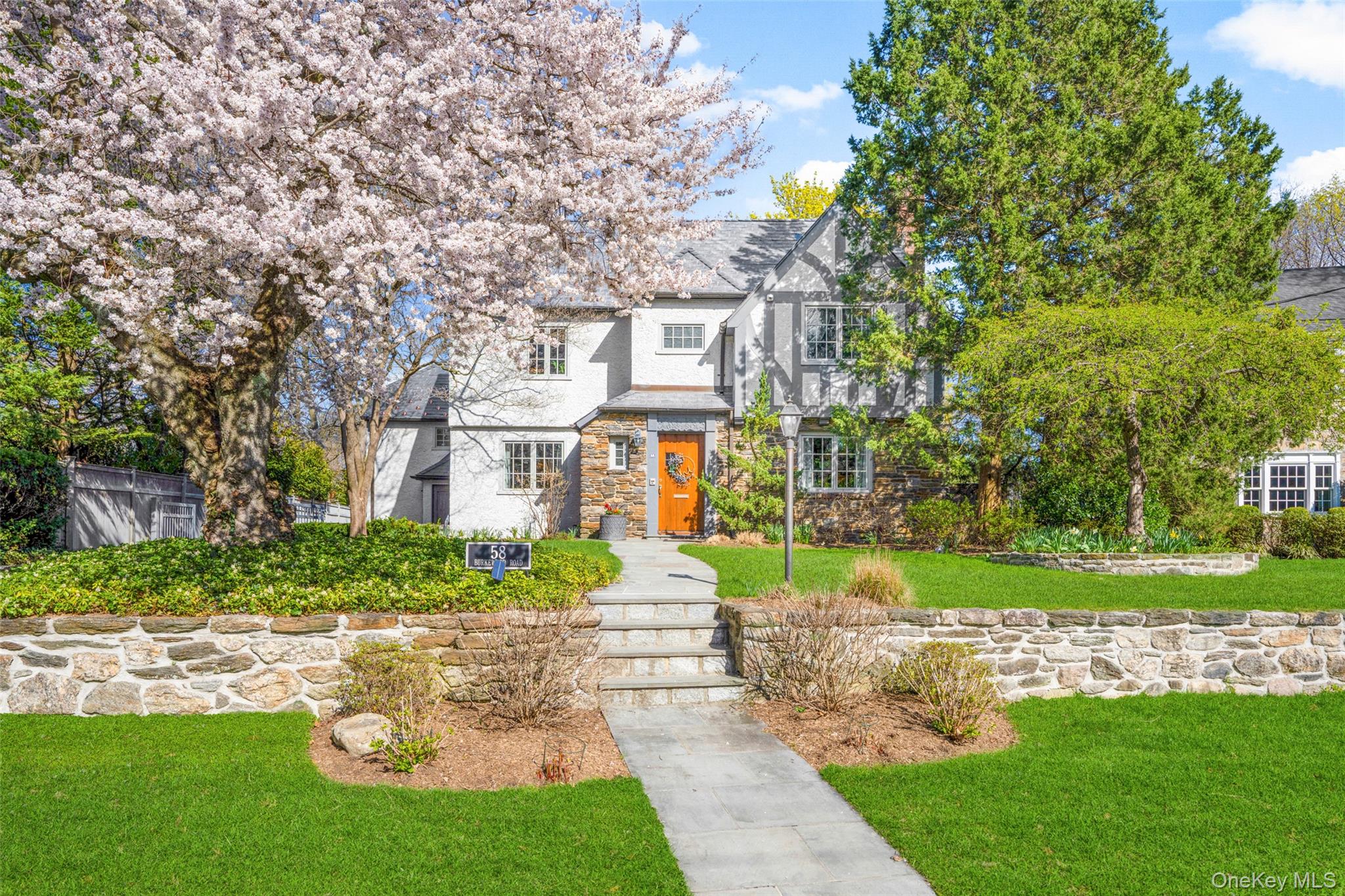 An exceptional Tudor home perfectly situated just moments from the Bro...