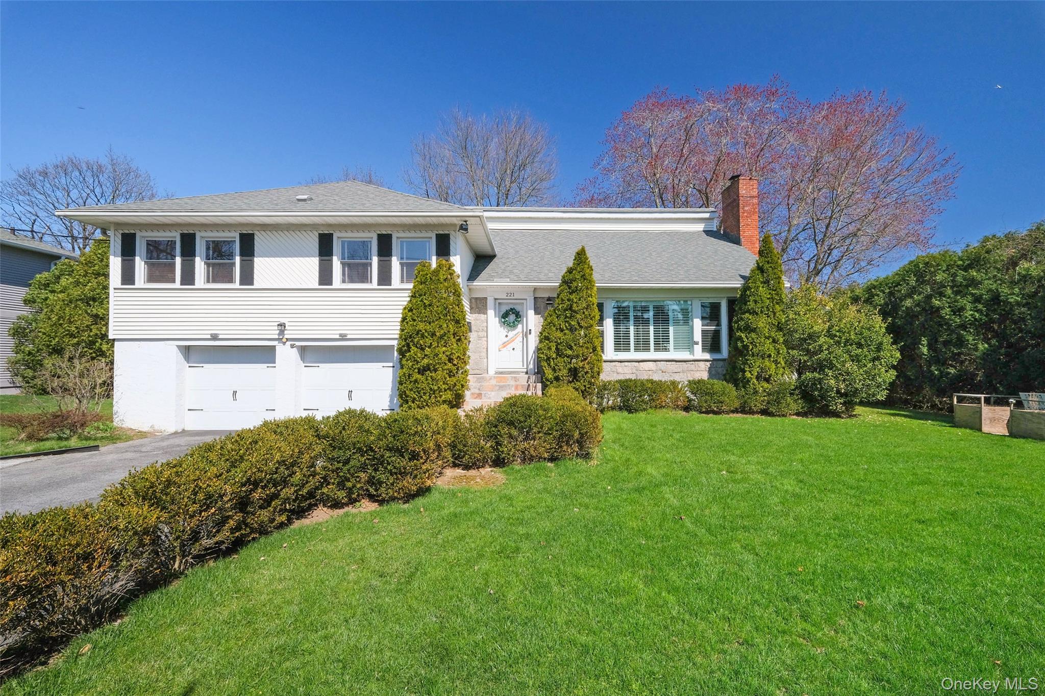 You will love this renovated open concept home in Scarsdale's sought a...